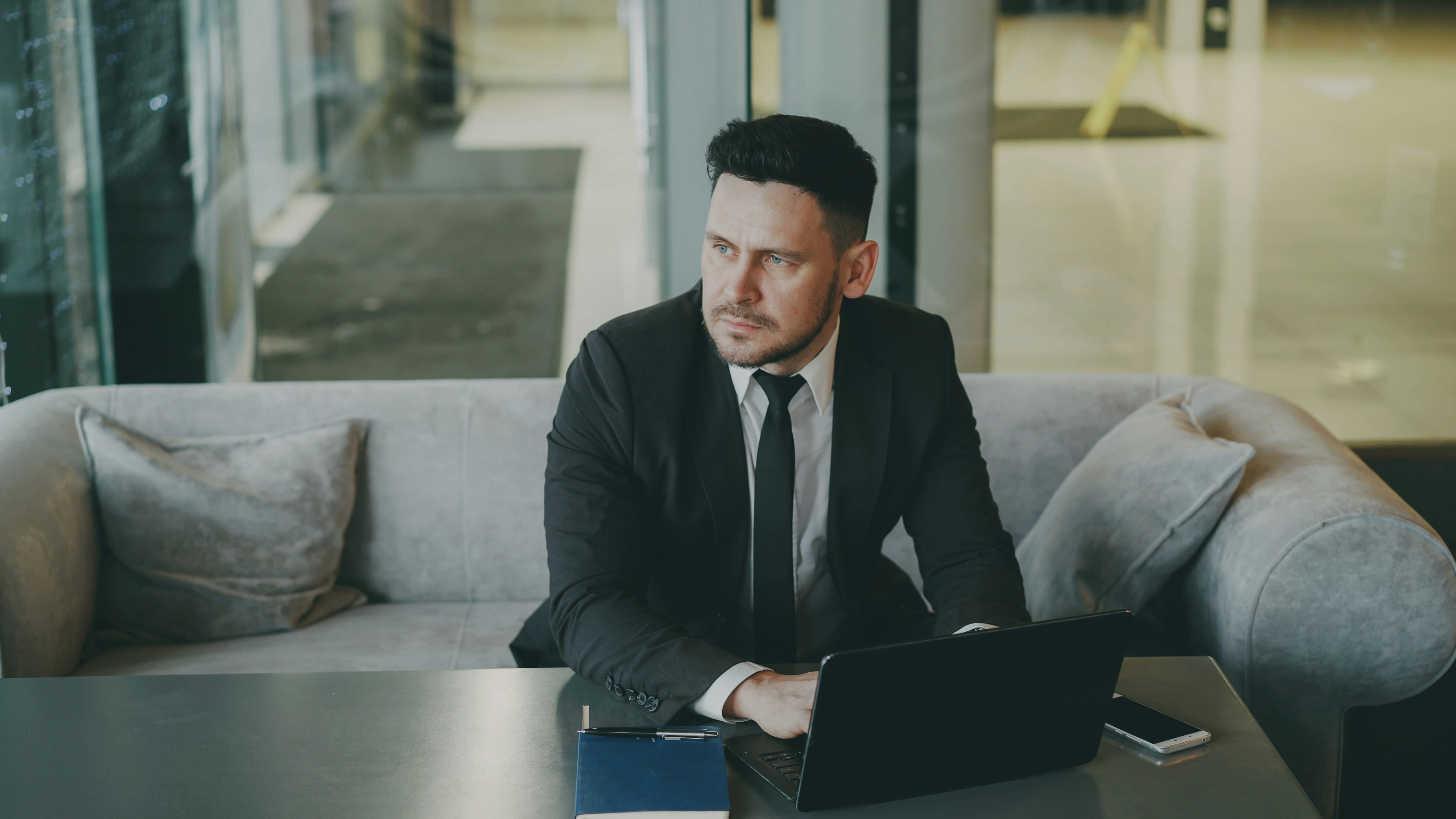 Attorney working on a laptop in an office